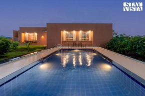StayVista at Terracotta Skies with Courtyard & Pool